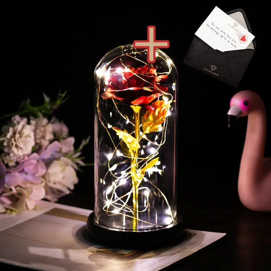 Gouden roos in glas en LED lampjes